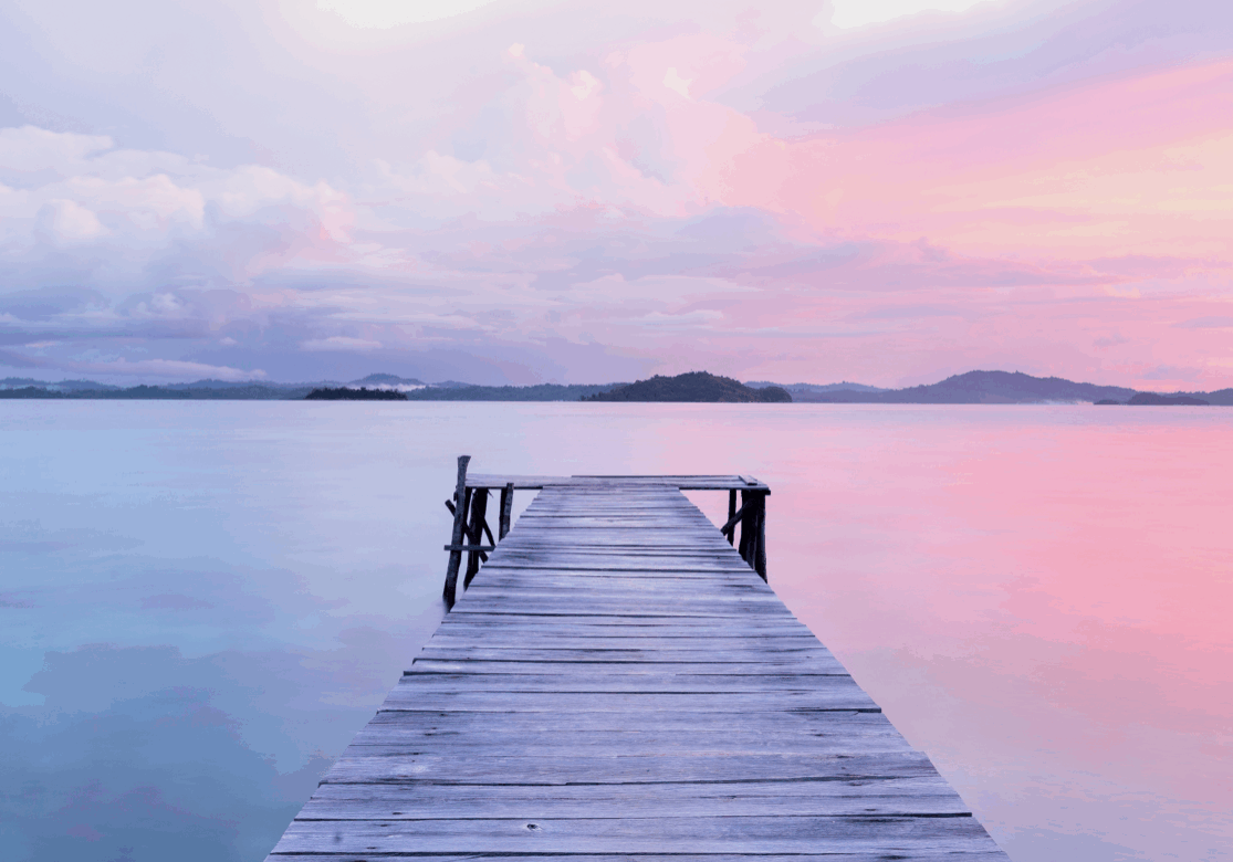 Tranquil pier extending into the lake